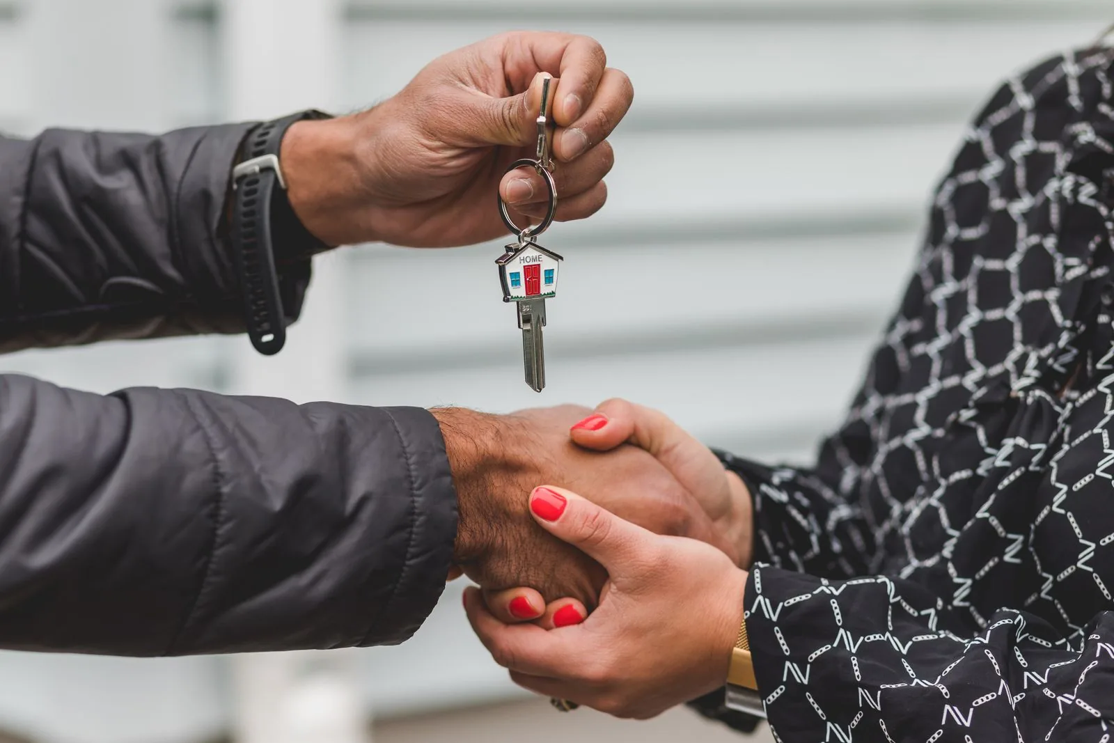 Handing over keys after a completed home service job