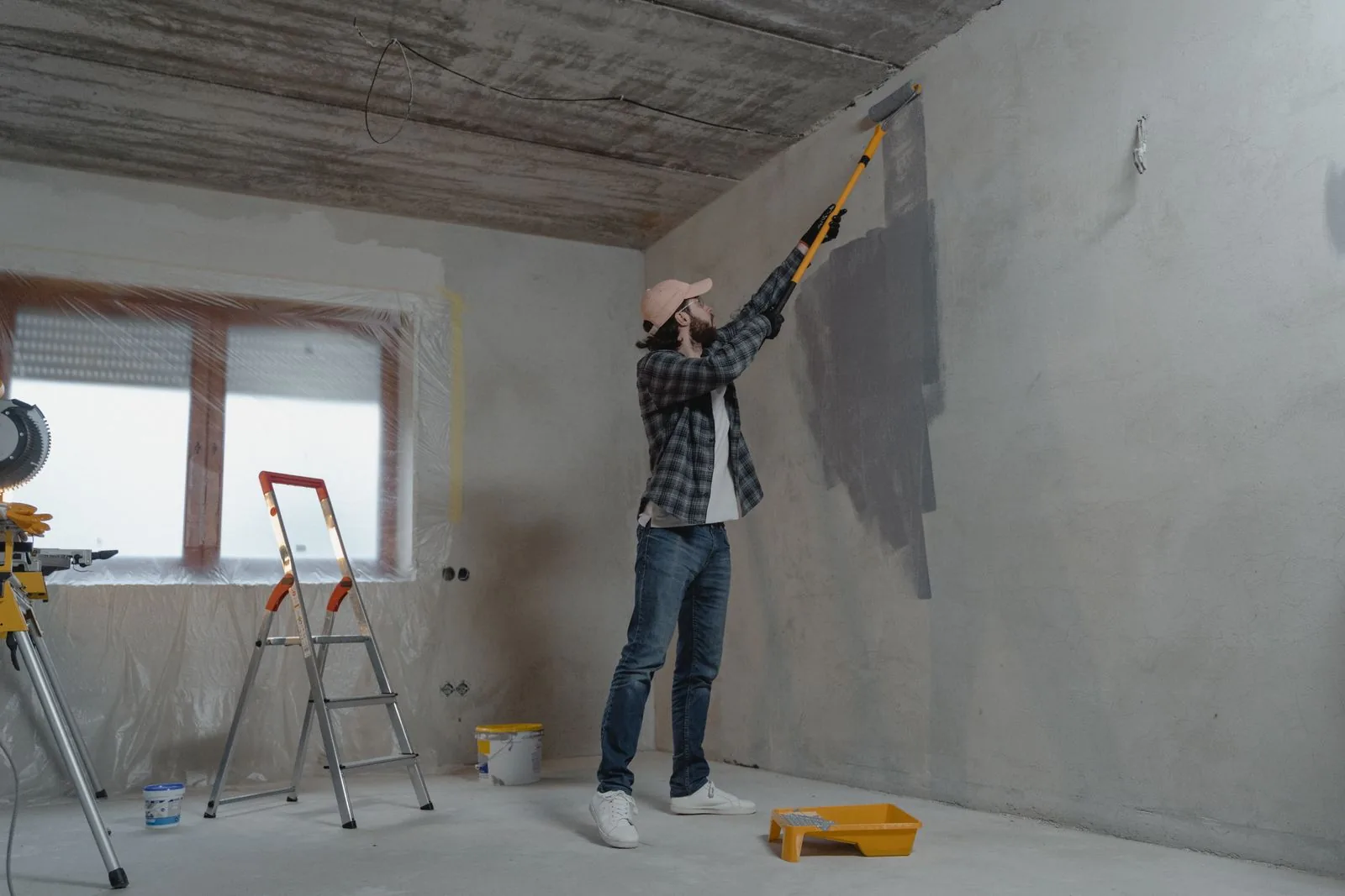 Contractor preparing an interior space during renovation